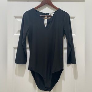 NWOT black bodysuit with gold detailing, M